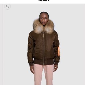 Artic army brand From UK.Saga sourced raccoon fur